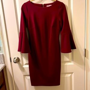 EUC Rich Wine color with gold full zipper. Princess cut on back.
